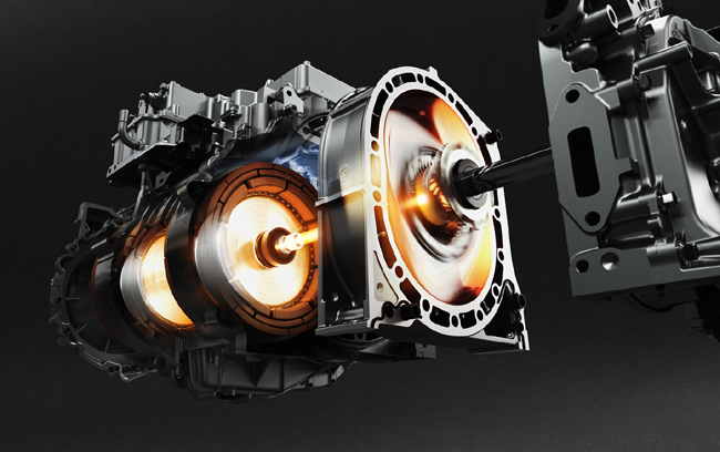 ▲必要とされる出力性能をコンパクトに実現できるロータリーエンジンの特長を活かし、高出力モーター、ジェネレーターと同軸上に配置してモータールームに搭載