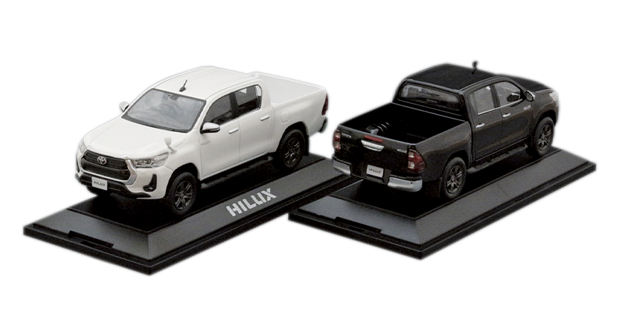 トヨタ・ハイラックスのミニカーを2名に。ハイラックスは現在生産を中止していますが、オーダー再開が待ち遠しいファンのためにディスプレイ用モデルを用意しました。ハイラックスは国内では普通貨物自動車の分類で、ナンバーの区分は１。車検は毎年受ける必要があるほか、自動車税や高速道路の料金設定が普通乗用車とは異なります。プレゼントのモデルは黒と白。希望カラーを明記して応募してください。