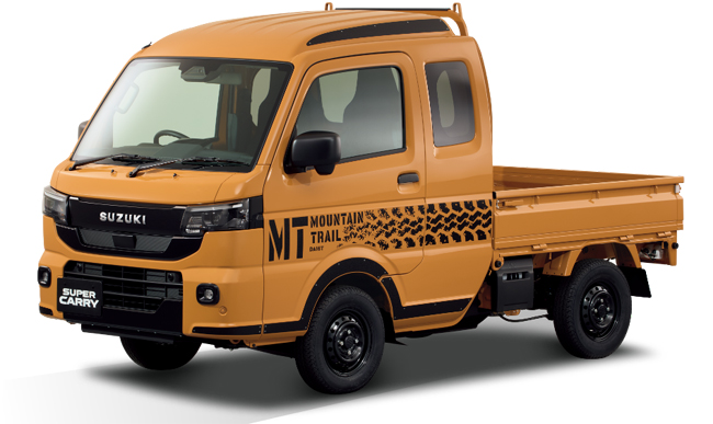 ▲スーパーキャリイはフロントグリルにブラックのカラーガーニッシュを採用。写真は専用デカールやブラック加飾カラードバンパー、ブラックメタリック塗装スチールホイールなどを装備した特別仕様車のXリミテッドで、ボディカラーはツールオレンジ