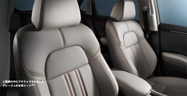 ▲特別仕様車のZR-V e:HEV Z CROSS TOURINGはマットグレーメタリックのハニカムパターンフロントグリルや新造形のフロントバンパー、マットブラック塗装18インチアルミホイール、グレージュのインテリアおよびオレンジステッチ入り本革シートなどを専用装備。写真のボディカラーはデザートベージュパール